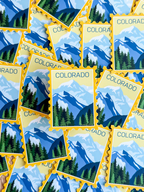 A collection of Colorado Mountains stamp stickers with a blue and green color scheme, featuring mountainous terrains.