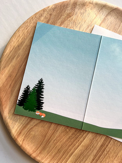 inside "Best Dad Ever" greeting card with outdoor cabin mountain illustration cad with envelope and wooden background