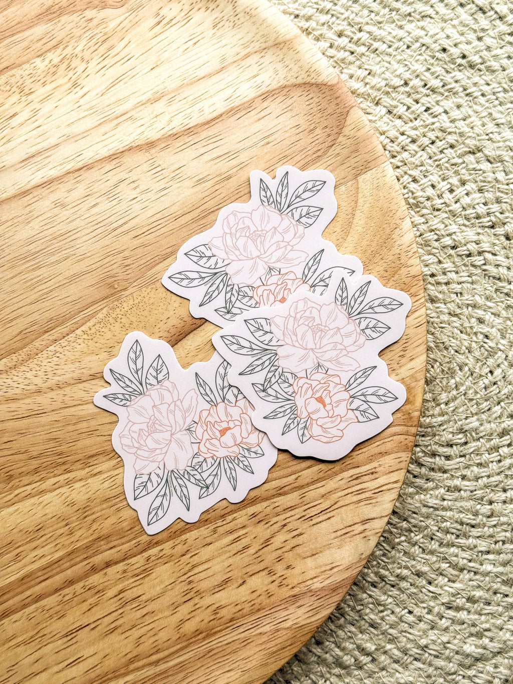  a vinyl sticker with a illustrated peony design.