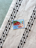 Connecticut stamp design sticker on a textured surface