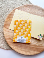 Nadia Design Co product with honeycomb pattern on a wooden surface