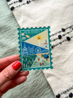 illustrated New Jersey Acrylic Stamp Magnet held and textured fabric behind