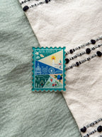 illustrated New Jersey Acrylic Stamp Magnet held and textured fabric behind