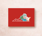 A postcard with an illustration of Virginia state landmarks on a red background with the word 'Virginia' written across the lower part of the state outline.