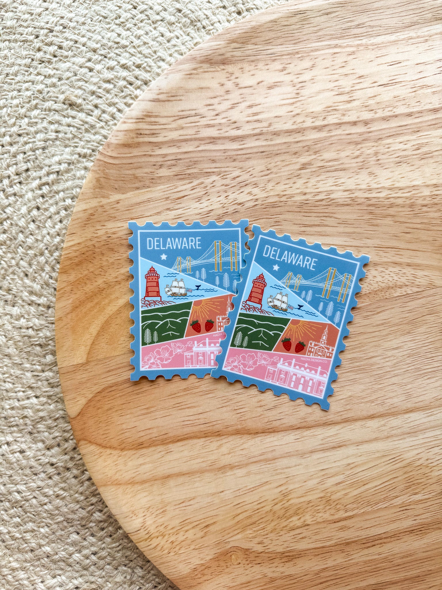 Stickers of Delaware with landmarks on a blue background