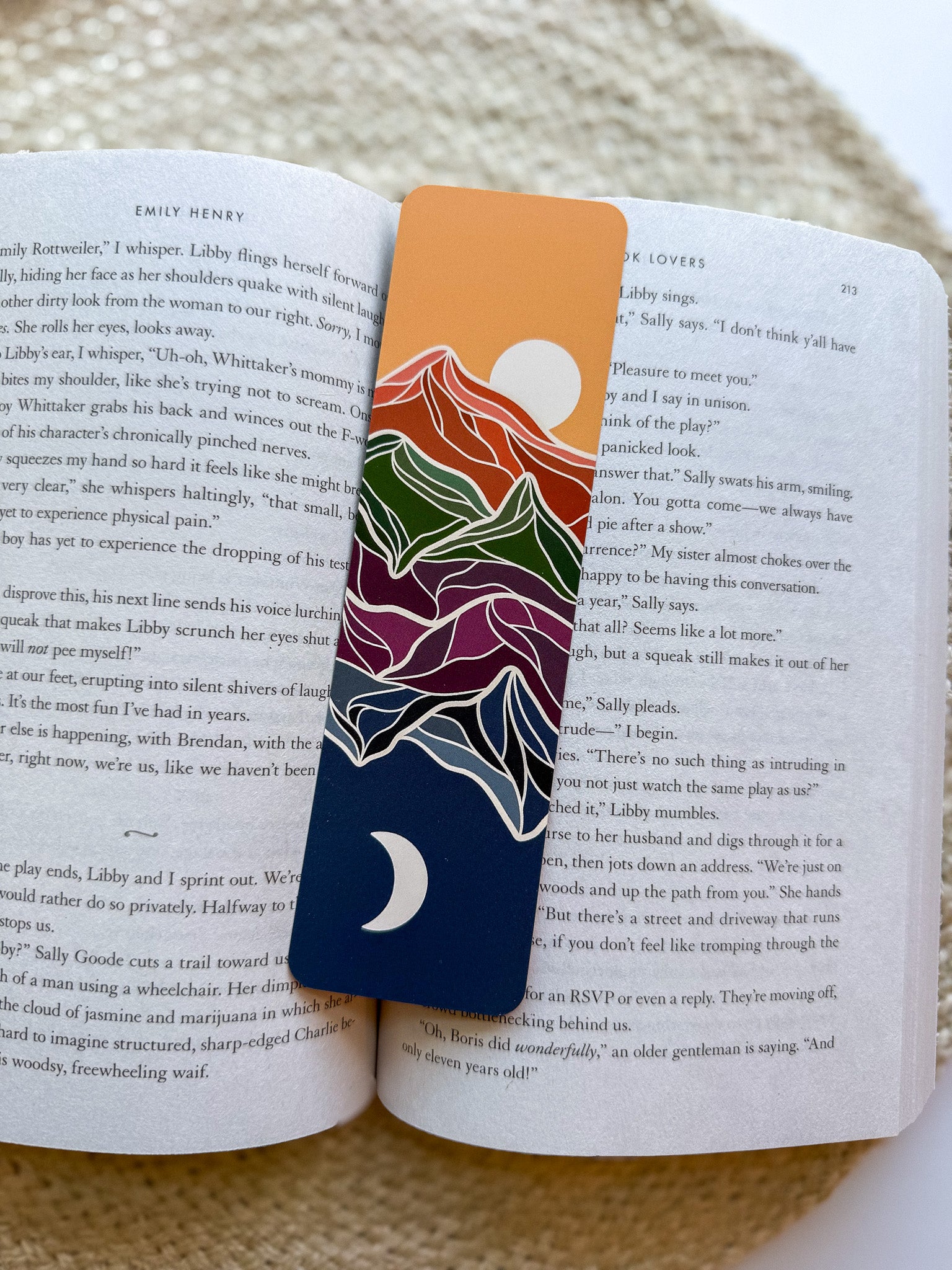 Bookmark with mountain design on an open book