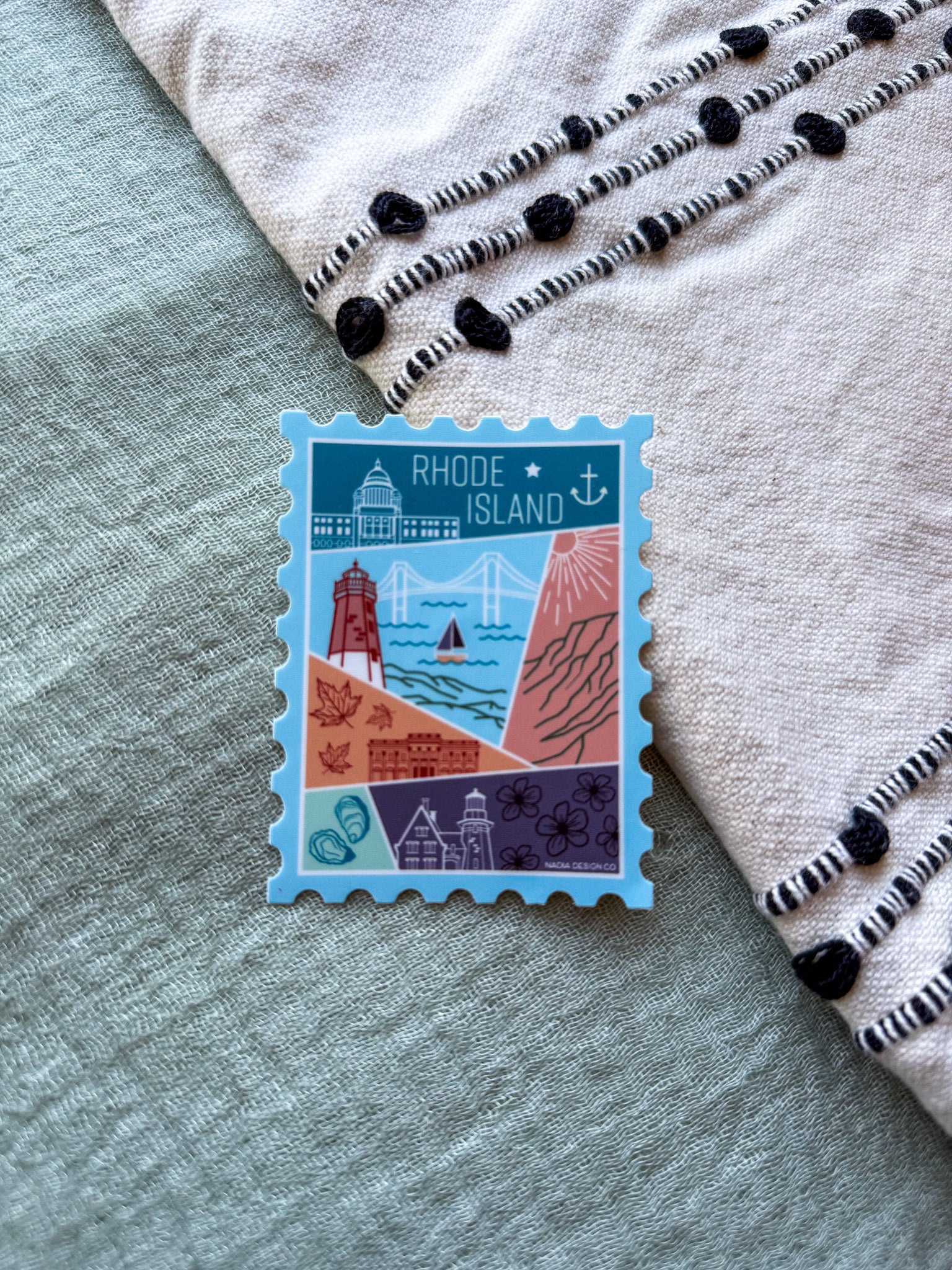 Rhode Island illustrated themed decorative sticker stamp shaped on fabric background