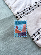 Rhode Island illustrated themed decorative sticker stamp shaped on fabric background
