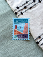 Rhode Island illustrated themed decorative sticker stamp shaped on fabric background