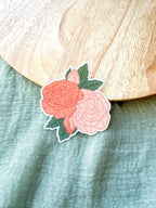Roses Floral sticker with pink and red roses on a wooden surface