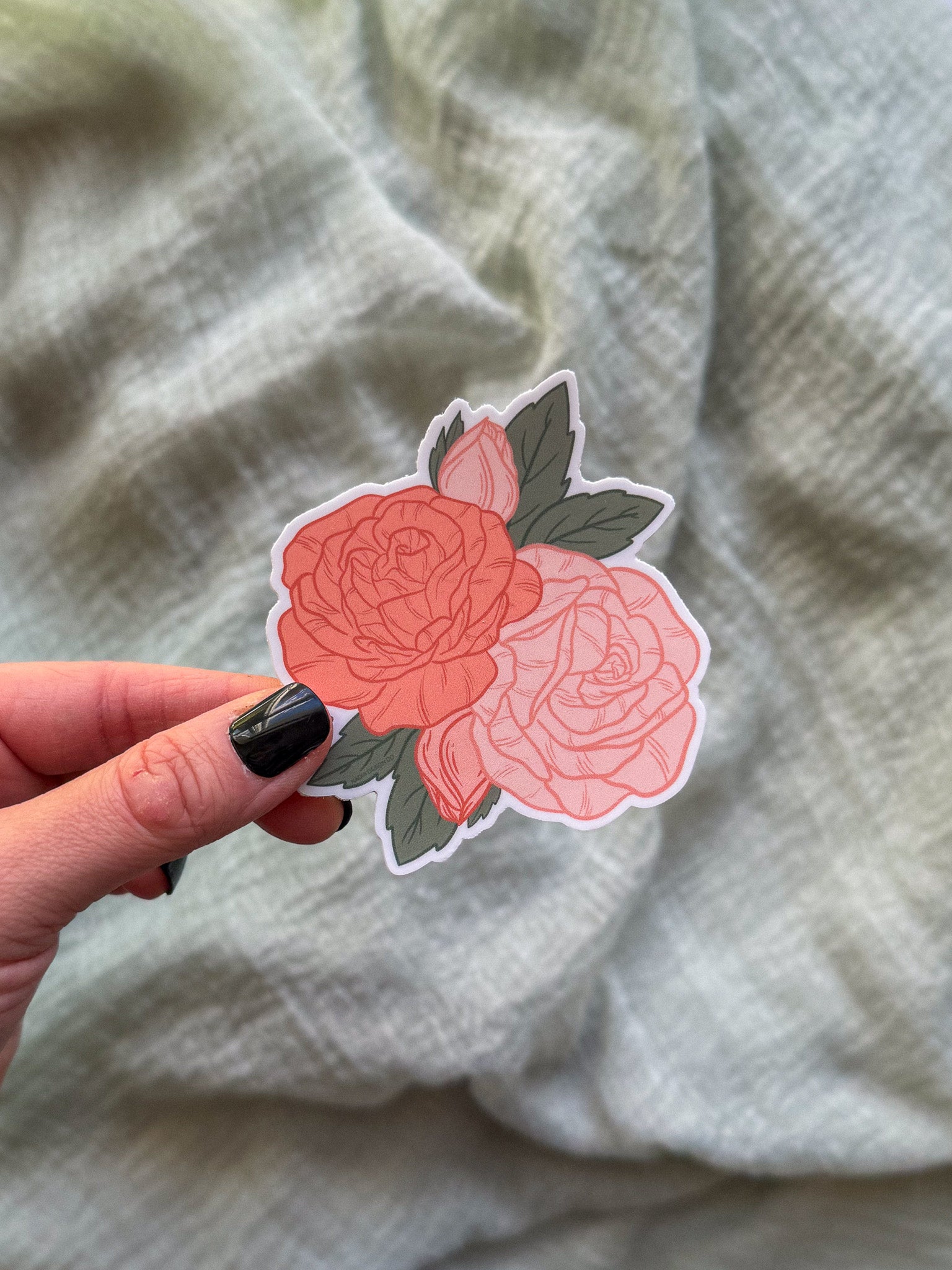 Roses Floral sticker with pink and red roses on a wooden surface