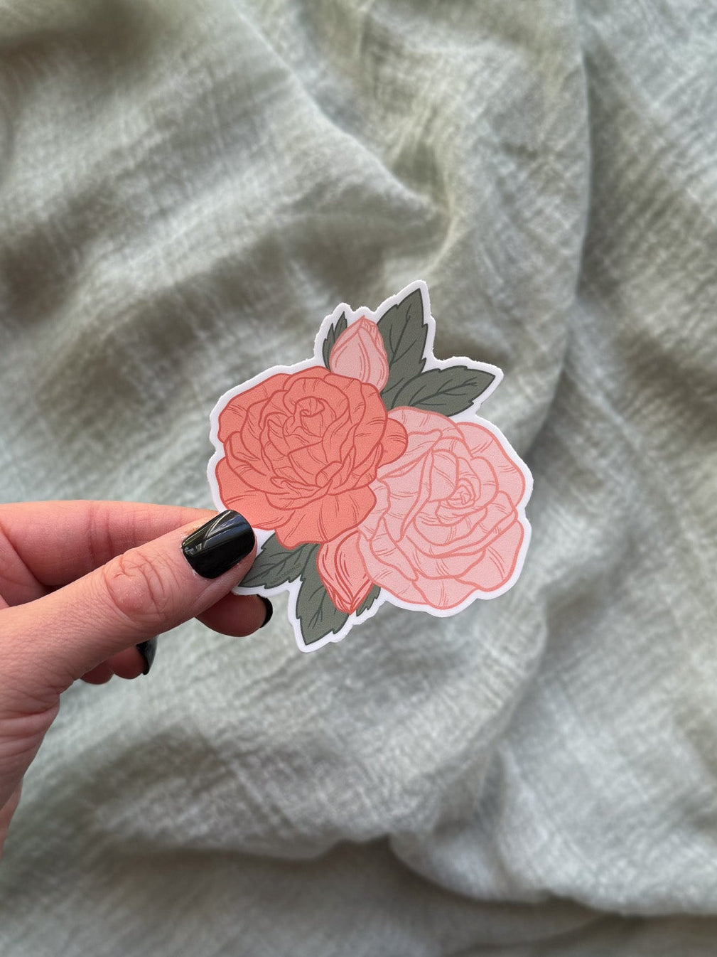Roses Floral sticker with pink and red roses on a wooden surface