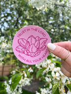 pink vinyl stickers with a floral design and the text 'TRUST IN THE LORD WITH ALL YOUR HEART' written on them.