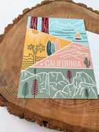 A colorful postcard featuring an illustration of California's landscape, including mountains, a beach, and iconic symbols like palm trees and a sailboat.