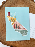 A colorful postcard featuring an illustration of California's landscape, including mountains, a beach, and iconic symbols like palm trees and a sailboat.