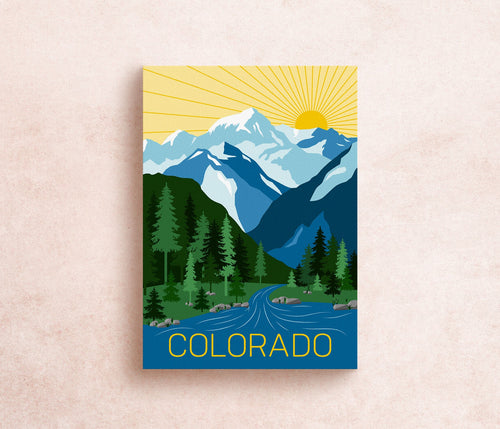 A postcard featuring an illustrated mountain range with the text 'COLORADO' at the bottom.