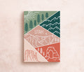 A postcard featuring a colorful illustration of Utah's landscape, including mountains and trees, with the word 'UTAH' prominently displayed.